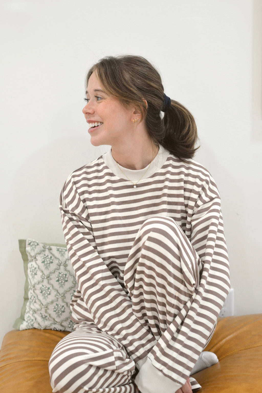 a woman in striped pajamas