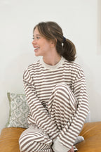 a woman in striped pajamas